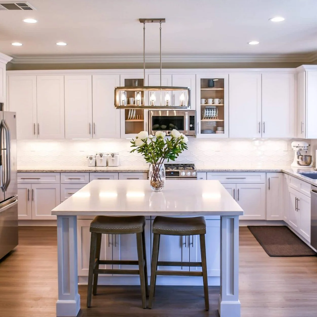 Incorporate pendant lights above the island for task lighting